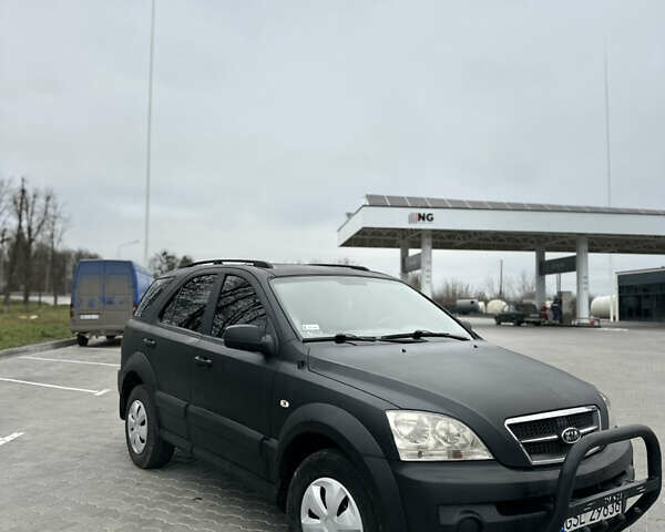 Черный Киа Соренто, объемом двигателя 2.5 л и пробегом 280 тыс. км за 3700 $, фото 1 на Automoto.ua