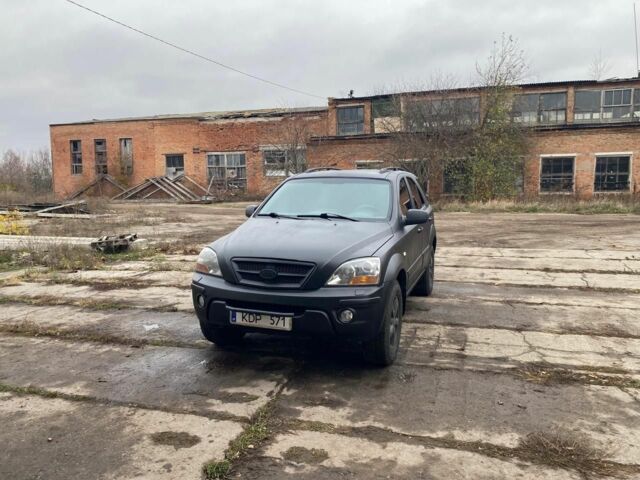 Черный Киа Соренто, объемом двигателя 2.5 л и пробегом 380 тыс. км за 5000 $, фото 1 на Automoto.ua