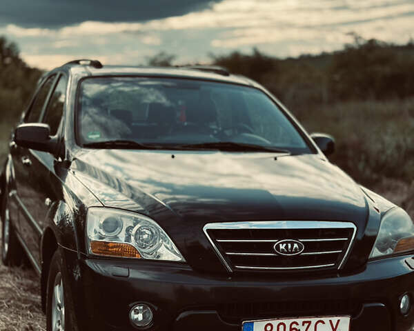 Черный Киа Соренто, объемом двигателя 2.5 л и пробегом 165 тыс. км за 4100 $, фото 1 на Automoto.ua