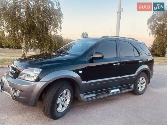 Черный Киа Соренто, объемом двигателя 2.5 л и пробегом 119 тыс. км за 8800 $, фото 1 на Automoto.ua