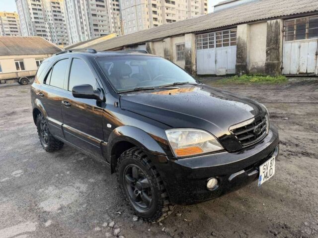 Черный Киа Соренто, объемом двигателя 2.5 л и пробегом 233 тыс. км за 4500 $, фото 1 на Automoto.ua