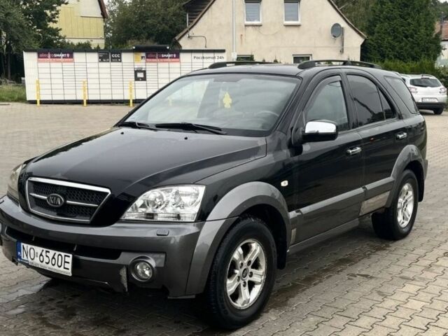Черный Киа Соренто, объемом двигателя 2.5 л и пробегом 256 тыс. км за 3500 $, фото 1 на Automoto.ua