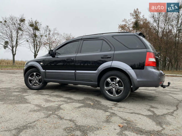 Чорний Кіа Соренто, об'ємом двигуна 2.5 л та пробігом 320 тис. км за 8299 $, фото 1 на Automoto.ua