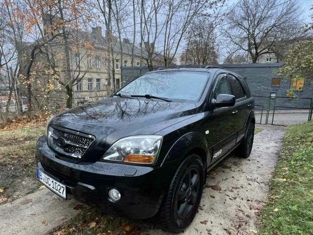 Черный Киа Соренто, объемом двигателя 2.5 л и пробегом 230 тыс. км за 4900 $, фото 1 на Automoto.ua