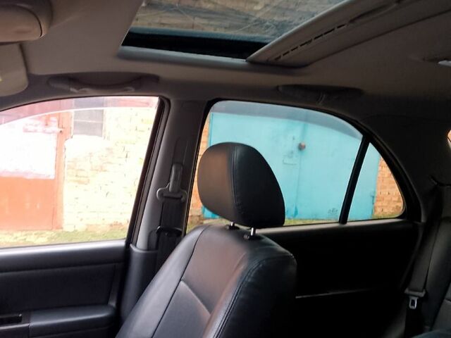 Черный Киа Соренто, объемом двигателя 2.5 л и пробегом 140 тыс. км за 9500 $, фото 1 на Automoto.ua