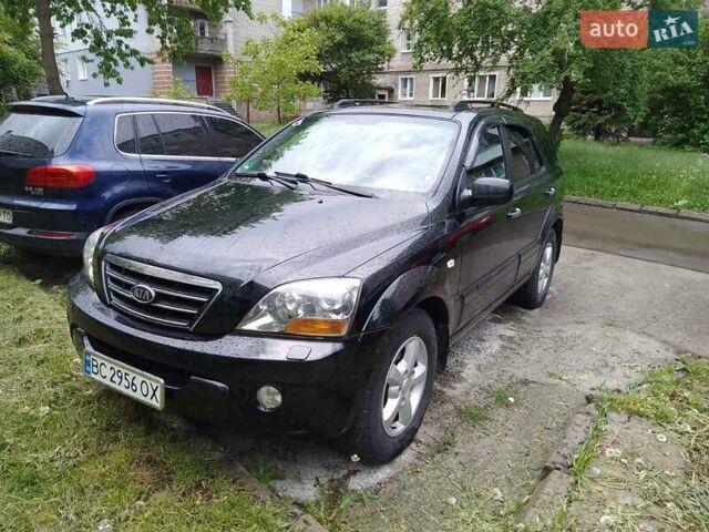 Черный Киа Соренто, объемом двигателя 2.5 л и пробегом 303 тыс. км за 7700 $, фото 1 на Automoto.ua