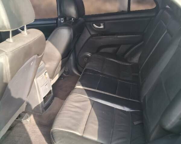 Черный Киа Соренто, объемом двигателя 2.5 л и пробегом 282 тыс. км за 8300 $, фото 1 на Automoto.ua