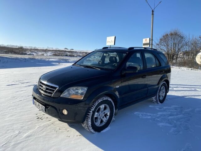 Чорний Кіа Соренто, об'ємом двигуна 2.5 л та пробігом 315 тис. км за 4499 $, фото 1 на Automoto.ua