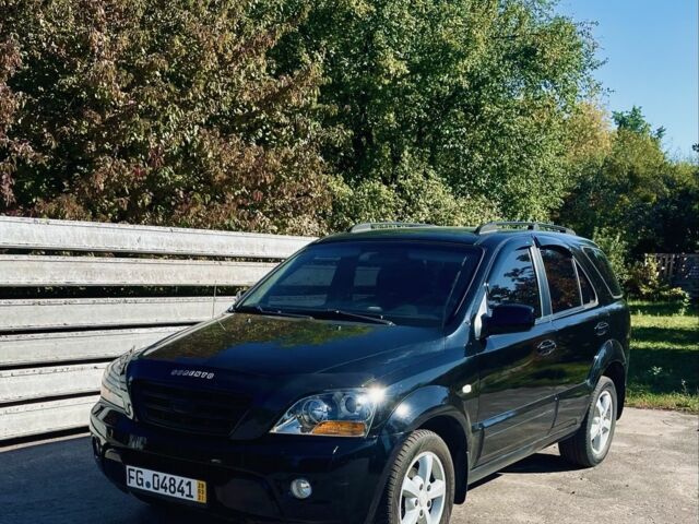 Чорний Кіа Соренто, об'ємом двигуна 2.5 л та пробігом 248 тис. км за 6000 $, фото 1 на Automoto.ua