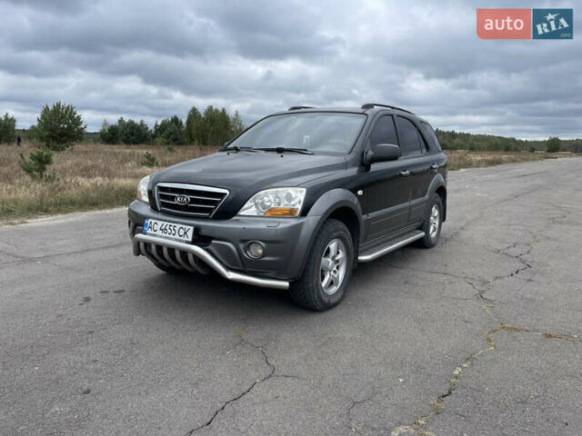 Черный Киа Соренто, объемом двигателя 2.5 л и пробегом 252 тыс. км за 6700 $, фото 1 на Automoto.ua