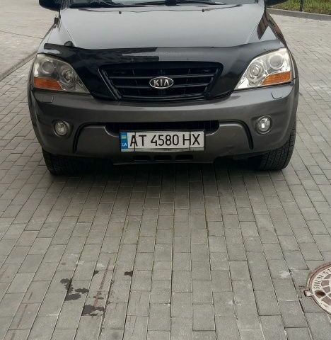 Черный Киа Соренто, объемом двигателя 2.5 л и пробегом 300 тыс. км за 8000 $, фото 1 на Automoto.ua