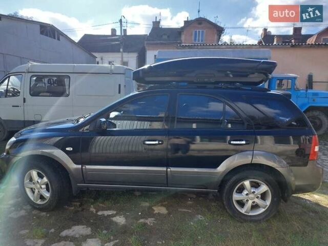 Черный Киа Соренто, объемом двигателя 2.5 л и пробегом 197 тыс. км за 10000 $, фото 1 на Automoto.ua