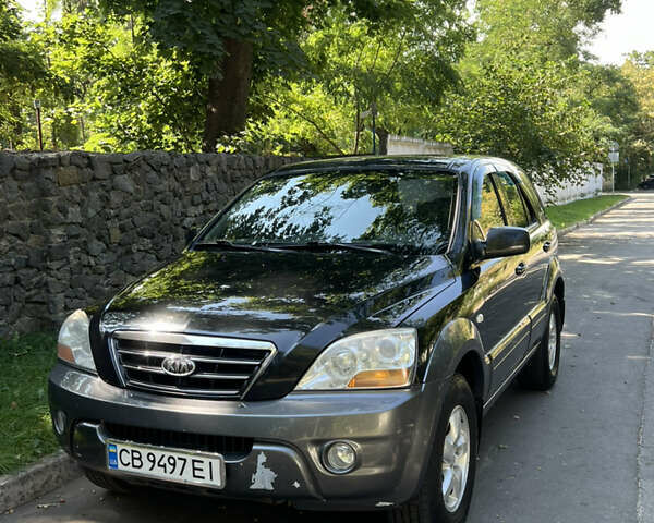 Черный Киа Соренто, объемом двигателя 2.5 л и пробегом 228 тыс. км за 9500 $, фото 1 на Automoto.ua