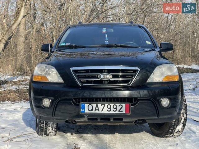 Черный Киа Соренто, объемом двигателя 2.5 л и пробегом 321 тыс. км за 5555 $, фото 1 на Automoto.ua