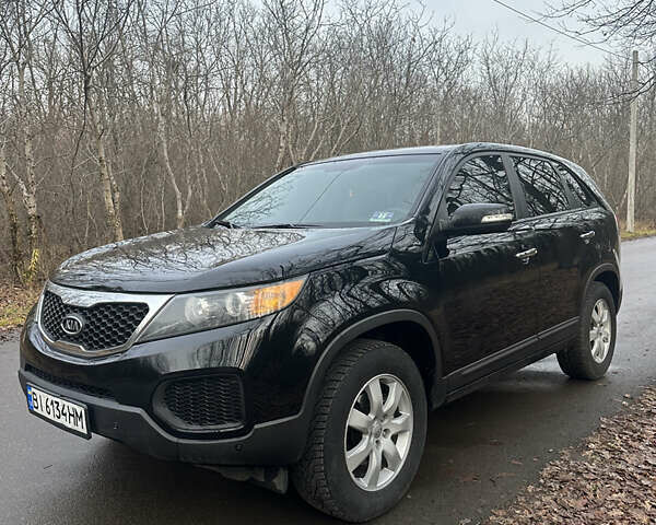 Черный Киа Соренто, объемом двигателя 2.36 л и пробегом 218 тыс. км за 12500 $, фото 1 на Automoto.ua
