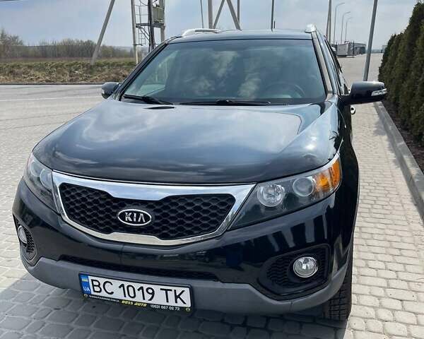 Черный Киа Соренто, объемом двигателя 2.4 л и пробегом 210 тыс. км за 12500 $, фото 1 на Automoto.ua