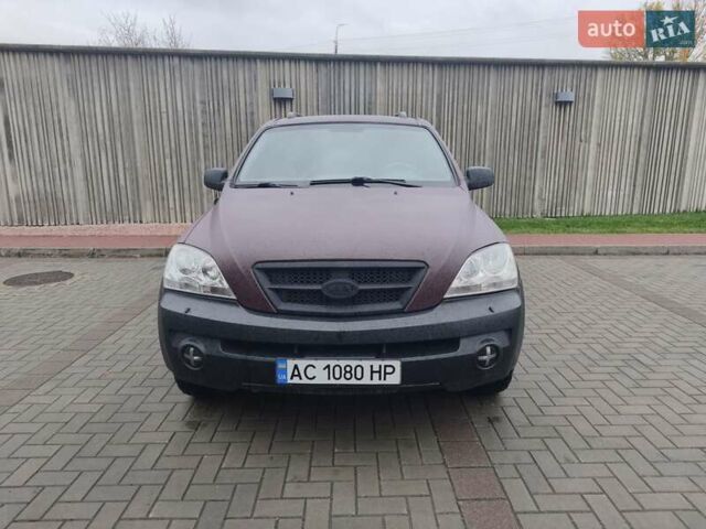 Красный Киа Соренто, объемом двигателя 2.5 л и пробегом 308 тыс. км за 7500 $, фото 1 на Automoto.ua