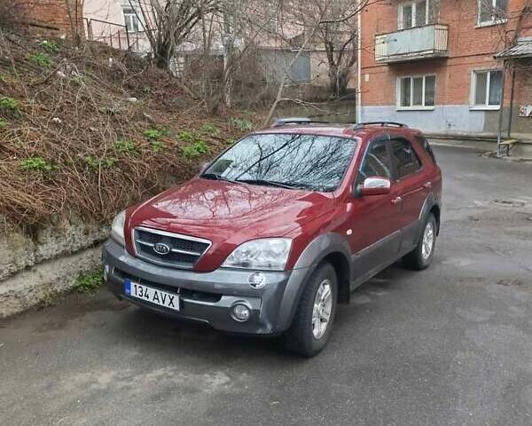 Красный Киа Соренто, объемом двигателя 2.5 л и пробегом 189 тыс. км за 4000 $, фото 1 на Automoto.ua
