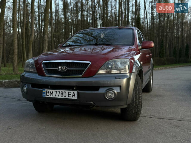 Красный Киа Соренто, объемом двигателя 2.5 л и пробегом 256 тыс. км за 8200 $, фото 1 на Automoto.ua
