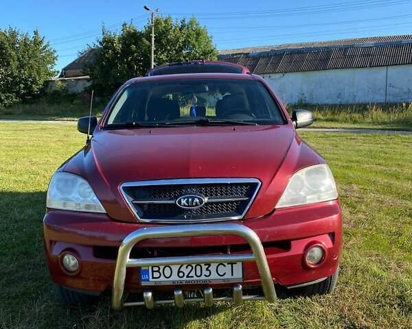 Красный Киа Соренто, объемом двигателя 2.4 л и пробегом 282 тыс. км за 6500 $, фото 1 на Automoto.ua