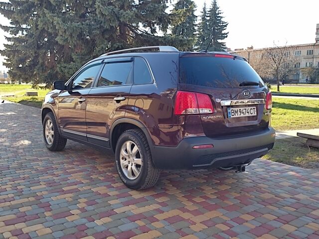 Червоний Кіа Соренто, об'ємом двигуна 2.4 л та пробігом 230 тис. км за 12500 $, фото 1 на Automoto.ua