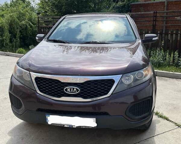 Красный Киа Соренто, объемом двигателя 2.36 л и пробегом 280 тыс. км за 11000 $, фото 1 на Automoto.ua