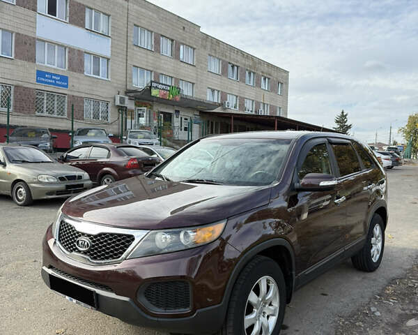 Красный Киа Соренто, объемом двигателя 2.4 л и пробегом 280 тыс. км за 10200 $, фото 1 на Automoto.ua