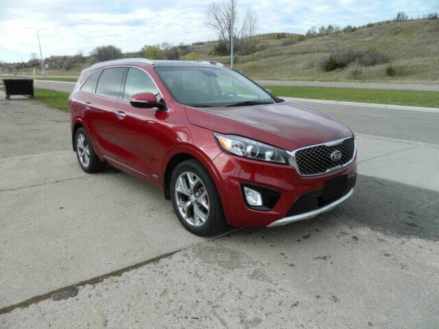 Червоний Кіа Соренто, об'ємом двигуна 3.3 л та пробігом 50 тис. км за 17100 $, фото 1 на Automoto.ua