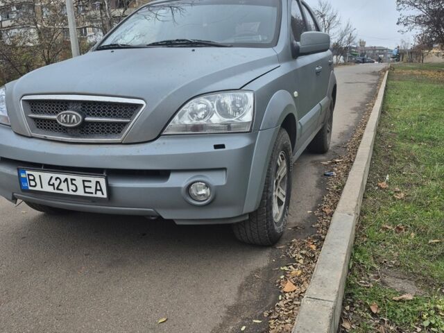 Серый Киа Соренто, объемом двигателя 2.4 л и пробегом 260 тыс. км за 4500 $, фото 1 на Automoto.ua