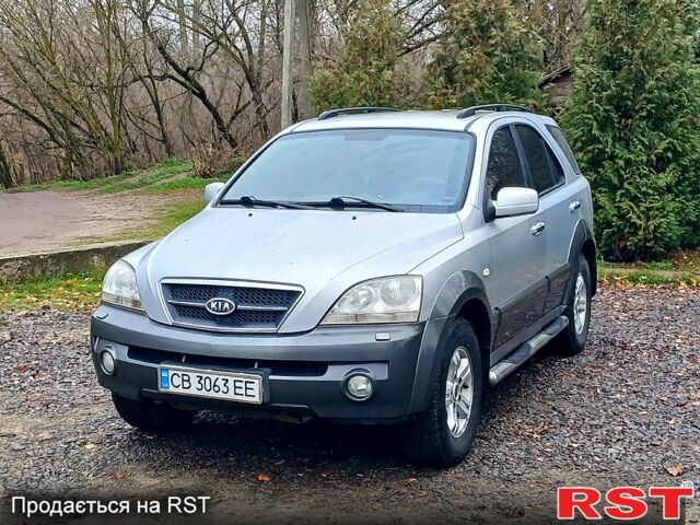 Серый Киа Соренто, объемом двигателя 2.4 л и пробегом 400 тыс. км за 5750 $, фото 1 на Automoto.ua