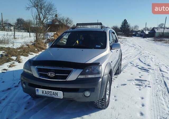 Серый Киа Соренто, объемом двигателя 2.5 л и пробегом 300 тыс. км за 8500 $, фото 1 на Automoto.ua