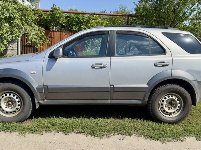 Сірий Кіа Соренто, об'ємом двигуна 2.5 л та пробігом 304 тис. км за 3818 $, фото 1 на Automoto.ua