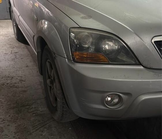 Серый Киа Соренто, объемом двигателя 2.5 л и пробегом 230 тыс. км за 4251 $, фото 1 на Automoto.ua