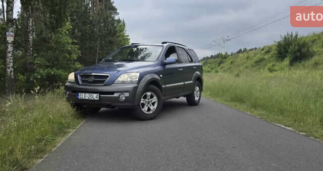 Синий Киа Соренто, объемом двигателя 2.5 л и пробегом 177 тыс. км за 3850 $, фото 1 на Automoto.ua