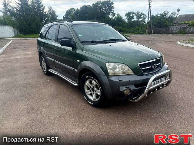 Зеленый Киа Соренто, объемом двигателя 2.5 л и пробегом 250 тыс. км за 4300 $, фото 1 на Automoto.ua