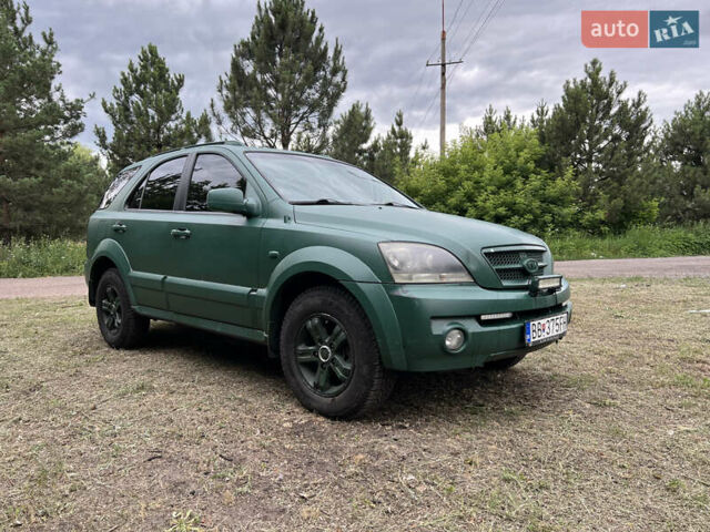 Зеленый Киа Соренто, объемом двигателя 2.5 л и пробегом 245 тыс. км за 4199 $, фото 1 на Automoto.ua