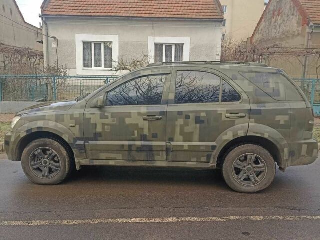 Зеленый Киа Соренто, объемом двигателя 2.5 л и пробегом 300 тыс. км за 4100 $, фото 1 на Automoto.ua