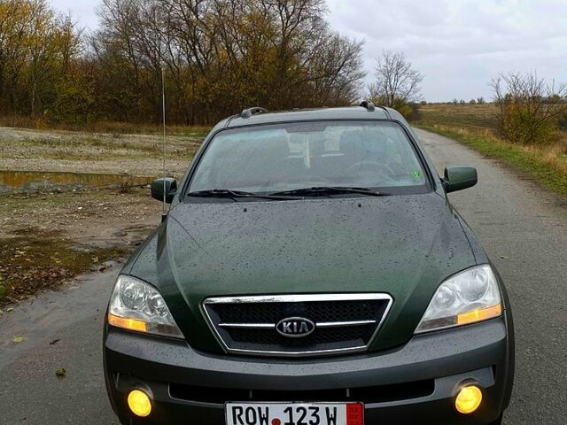 Зеленый Киа Соренто, объемом двигателя 2.5 л и пробегом 278 тыс. км за 4500 $, фото 1 на Automoto.ua