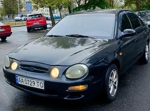 Чорний Кіа Спектра, об'ємом двигуна 1.8 л та пробігом 280 тис. км за 2700 $, фото 1 на Automoto.ua