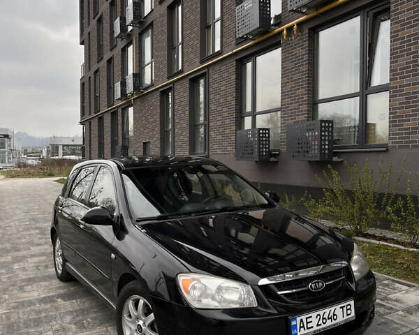 Черный Киа Спектра, объемом двигателя 2 л и пробегом 450 тыс. км за 4400 $, фото 1 на Automoto.ua