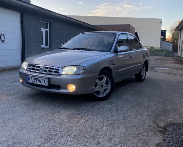 Серый Киа Спектра, объемом двигателя 1.6 л и пробегом 252 тыс. км за 2700 $, фото 1 на Automoto.ua