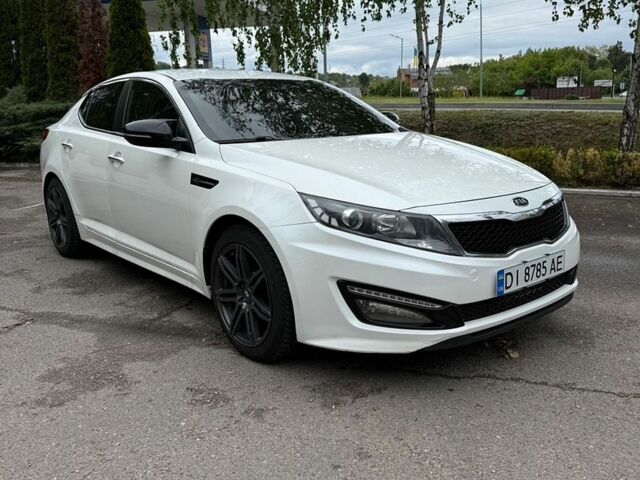 Белый Киа K5, объемом двигателя 2 л и пробегом 349 тыс. км за 8300 $, фото 1 на Automoto.ua