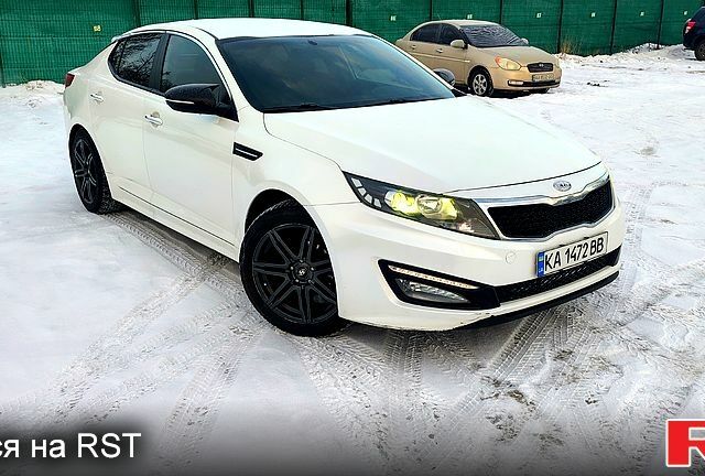 Білий Кіа K5, об'ємом двигуна 2 л та пробігом 26700 тис. км за 7500 $, фото 1 на Automoto.ua
