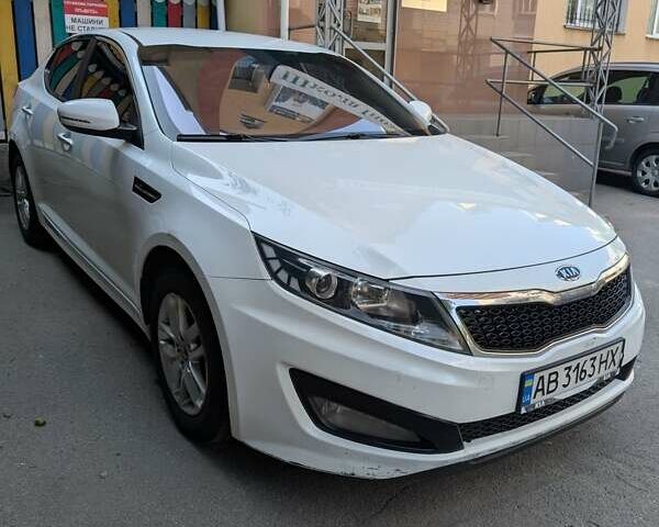 Белый Киа K5, объемом двигателя 2 л и пробегом 298 тыс. км за 7700 $, фото 1 на Automoto.ua