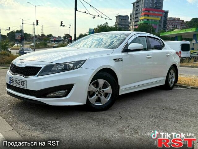 Білий Кіа K5, об'ємом двигуна 2 л та пробігом 172 тис. км за 7200 $, фото 1 на Automoto.ua