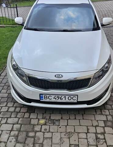 Білий Кіа K5, об'ємом двигуна 2 л та пробігом 255 тис. км за 10300 $, фото 1 на Automoto.ua