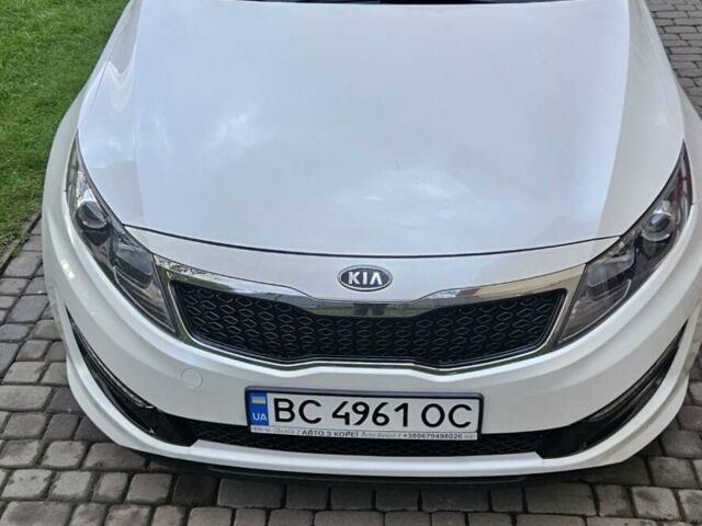 Белый Киа K5, объемом двигателя 2 л и пробегом 255 тыс. км за 10300 $, фото 1 на Automoto.ua