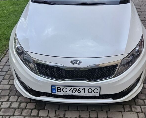Білий Кіа K5, об'ємом двигуна 2 л та пробігом 255 тис. км за 10300 $, фото 1 на Automoto.ua