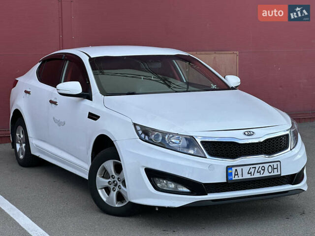 Білий Кіа K5, об'ємом двигуна 2 л та пробігом 422 тис. км за 6999 $, фото 1 на Automoto.ua