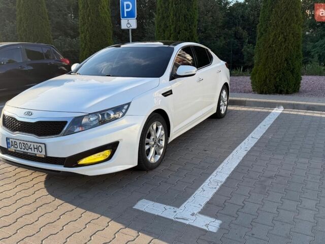 Белый Киа K5, объемом двигателя 2 л и пробегом 315 тыс. км за 9000 $, фото 1 на Automoto.ua